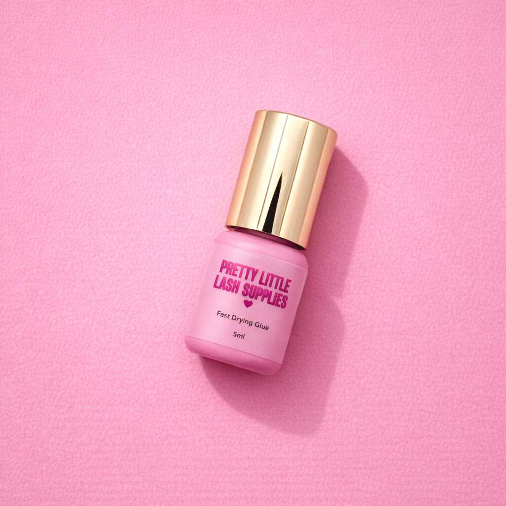 Fast-drying pink lash glue in a 5ml bottle with a gold cap from Pretty Little Lash Supplies.