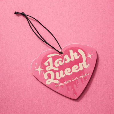 Pink heart-shaped car scent with "Lash Queen" in white text, featuring a glossy finish and black string for hanging.