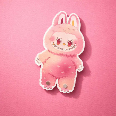 Cute pink/yellow labubu lash tile, featuring whimsical facial expressions and soft, fluffy texture.