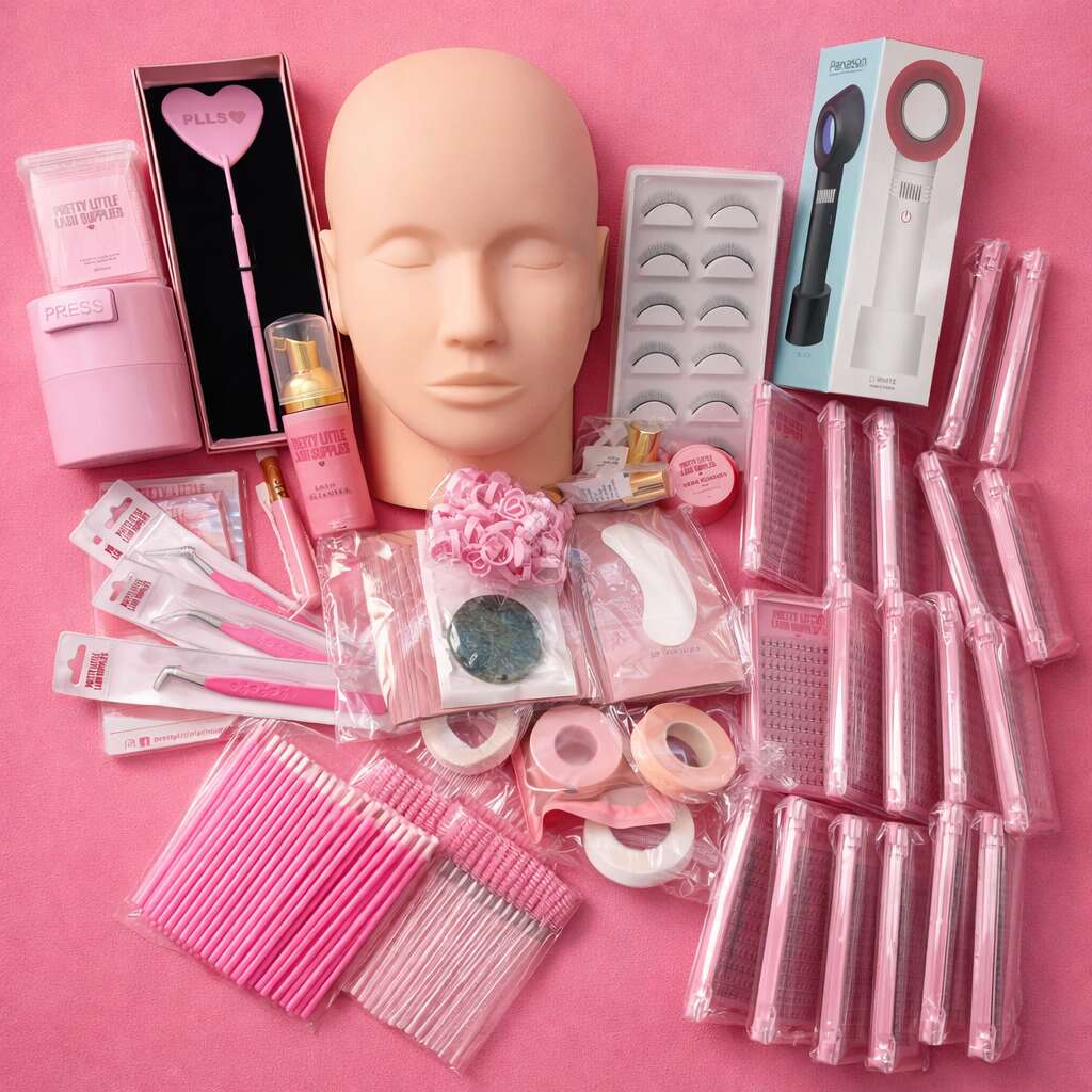 Pink beauty supplies kit with mannequin head, false eyelashes, applicators, and various tools for makeup application.