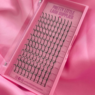Black eyelash extensions in a pink case, featuring a range of lengths from 12mm to 15mm, ideal for lash styling.