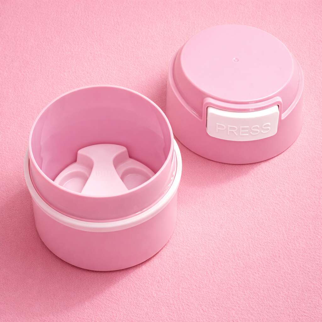 Pink insulated food container with a white press button lid, perfect for keeping meals fresh on the go.