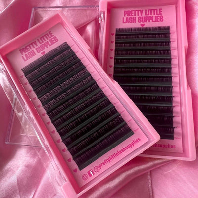 0.07 D-MIX black eyelash extensions in a pink tray, featuring varied lengths from 8mm to 15mm for a dramatic look.