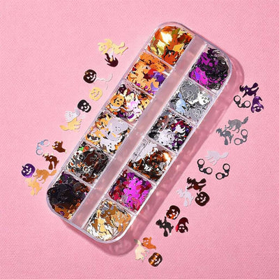 Colorful Halloween-themed nail glitter set in a clear container, featuring ghosts, pumpkins, and bats. Perfect for nail art.
