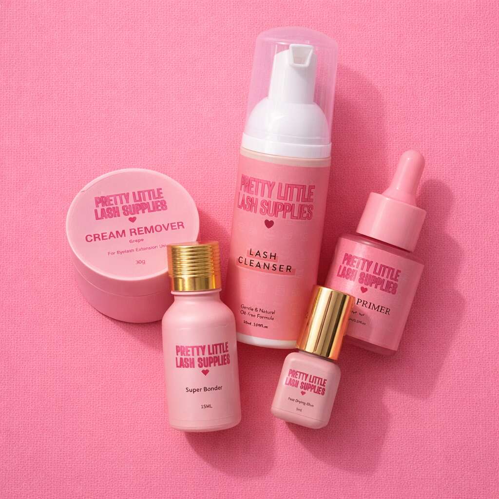 Pretty Little Lash Supplies pink lash cleanser, primer, super bonder, and cream remover in stylish packaging.