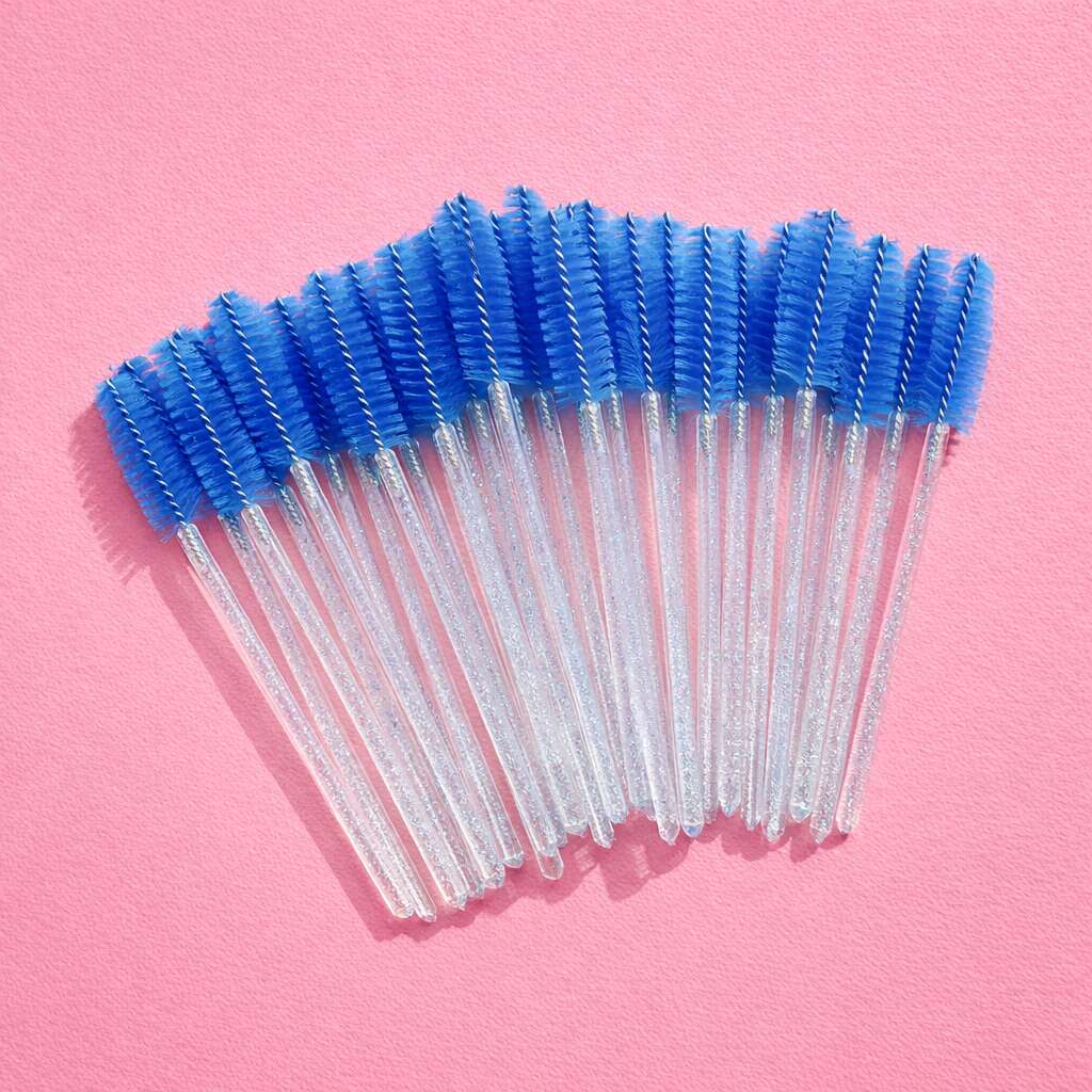 Set of 20 blue silicone brush cleaning wands on a pink background, perfect for makeup and beauty application.