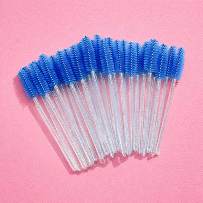 Set of 20 blue silicone brush cleaning wands on a pink background, perfect for makeup and beauty application.
