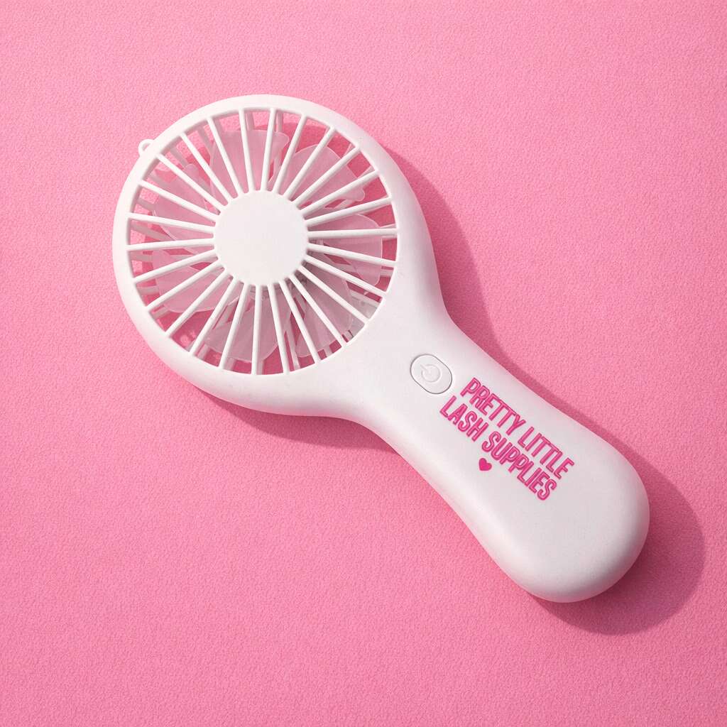 White handheld fan with pink logo, perfect for lash application and beauty routines.