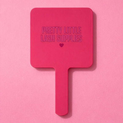 Pink lash mirror with text "Pretty Little Lash Supplies" and heart detail.