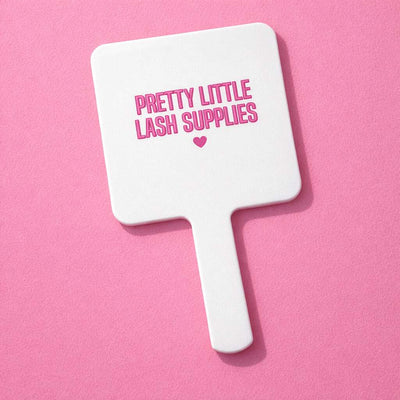 White lash mirror with pink lettering, featuring "Pretty Little Lash Supplies" on a vibrant pink background.