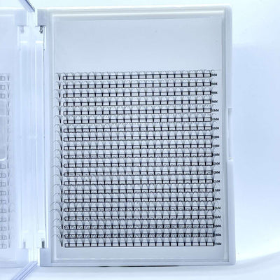 White plastic storage case containing a grid of black and white, numbered labels for organization and crafting.